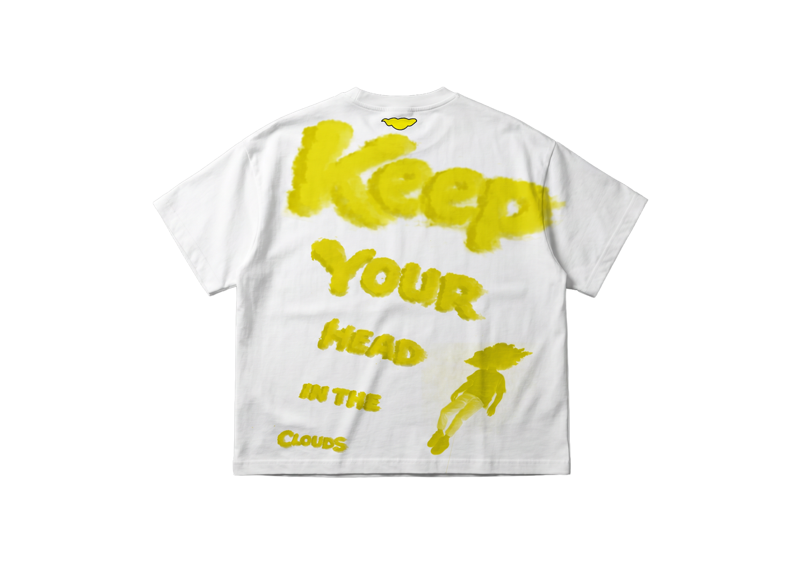 CCCumulus Yellow 01 — flat lay back, white oversized tee with yellow 'Keep Your Head In The Clouds' text